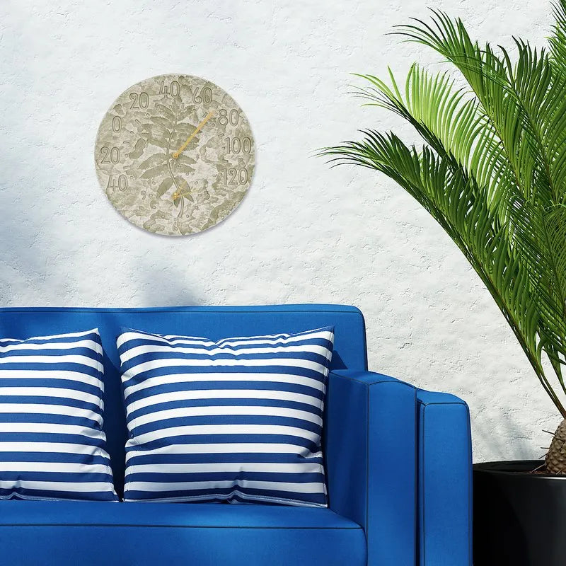 Whitehall Fossil Sumac clock and thermometer with botanical planting and blue seating