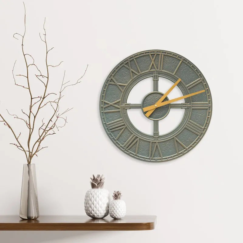 Whitehall Hera clock in a minimalist setting with vase, dried branch and cactus